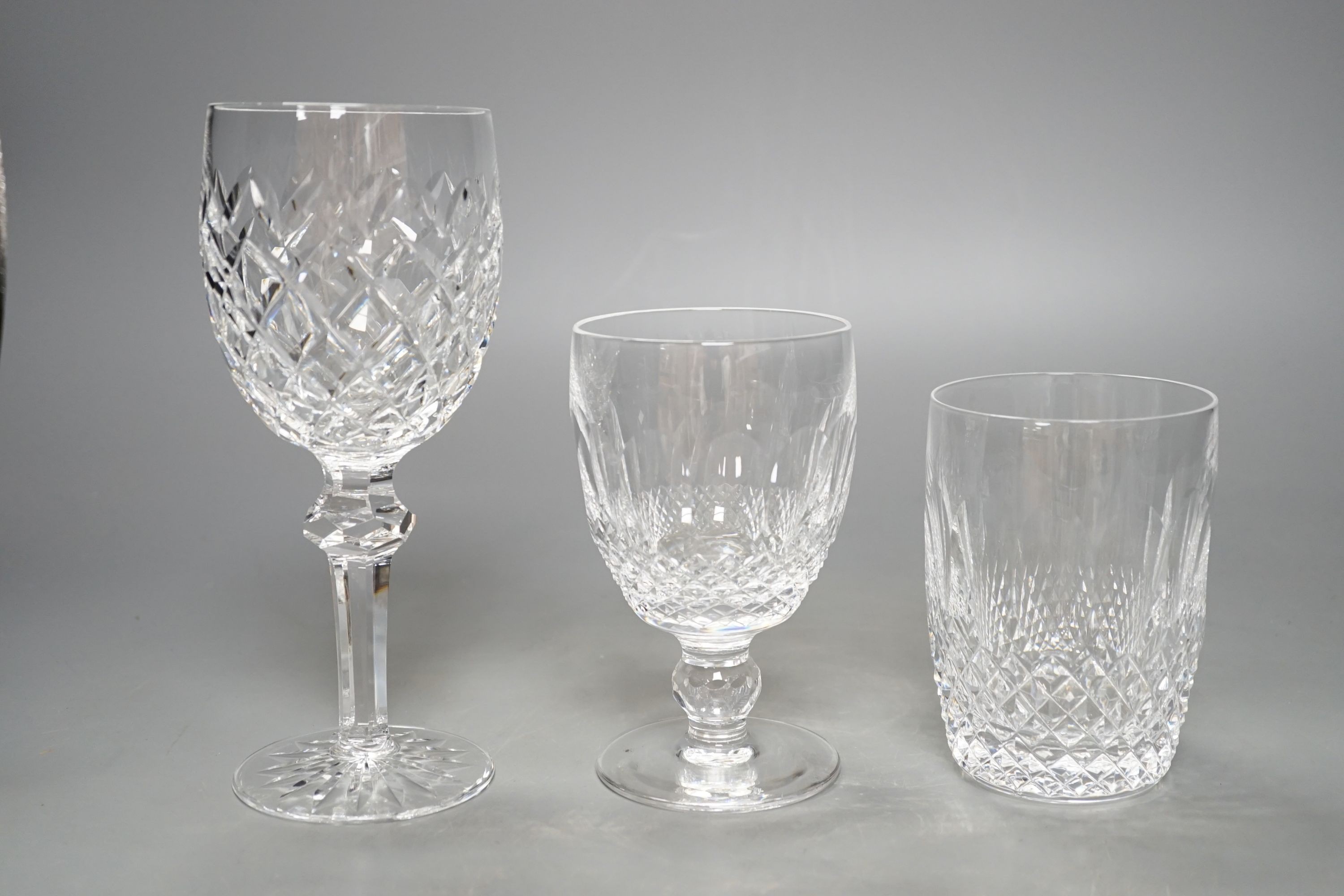 A set of eighteen Waterford cut crystal low goblets and tumblers and twelve further Waterford cut crystal wine glasses in a different pattern
